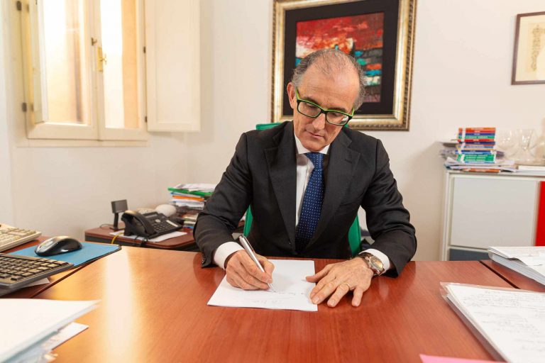 Luca Lambertini al lavoro nel suo ufficio